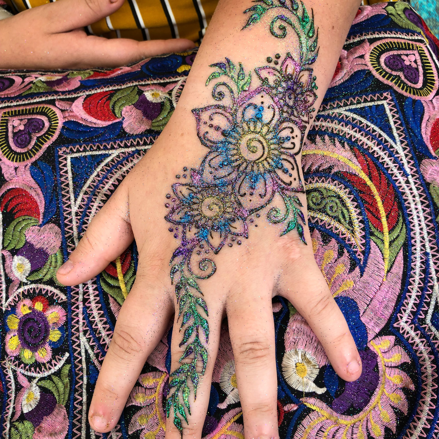 Henna design with glitter